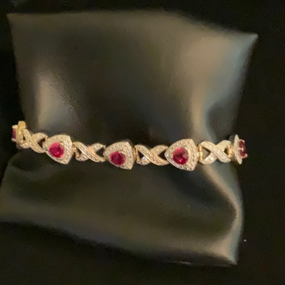8 rubies in this bracelet which is stamped 925.